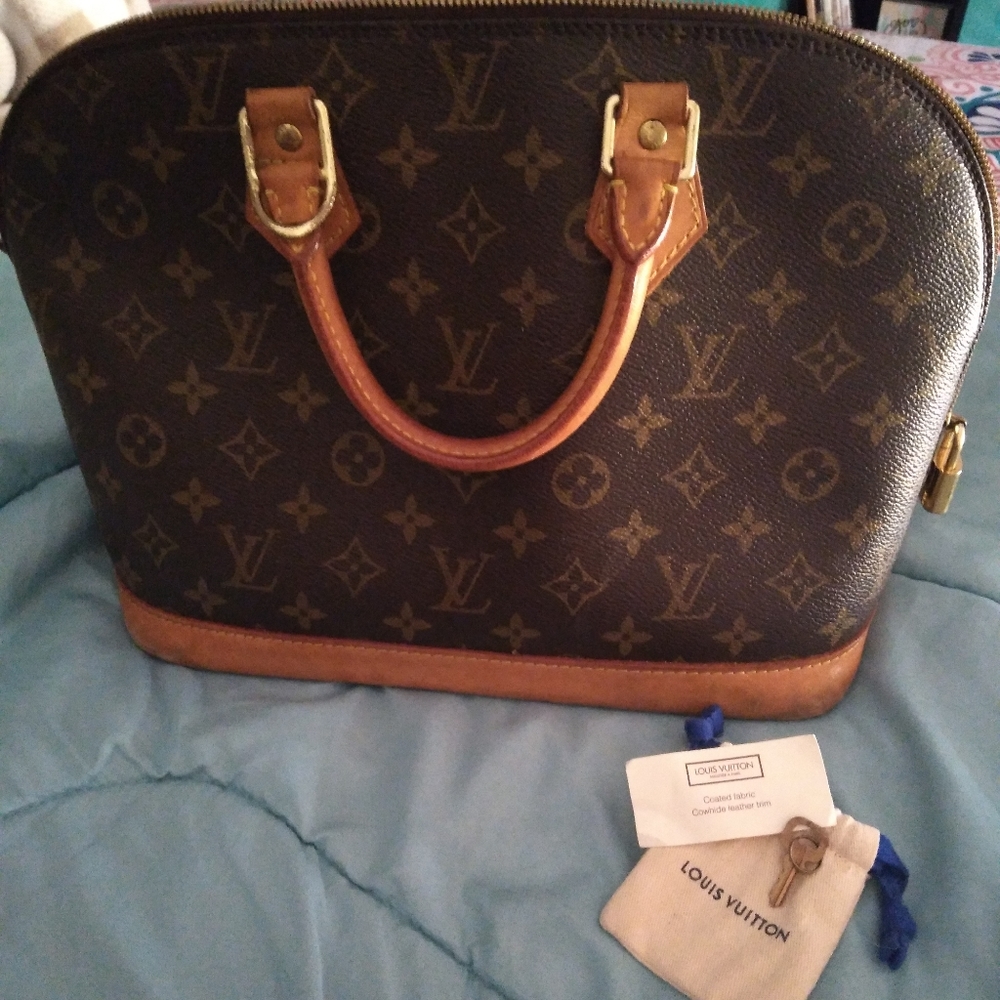 Authentic vintage Louis Vuitton Alma Handbag